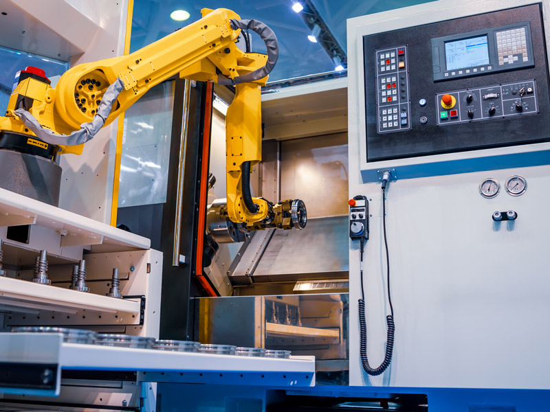 Robotic arm in factory demonstrating the power of advanced machinery and automation on the factory floor