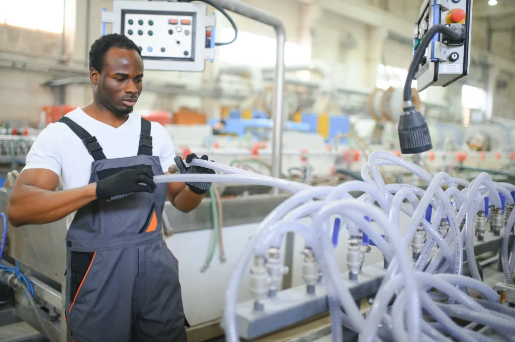 Worker on a manufacturing machine