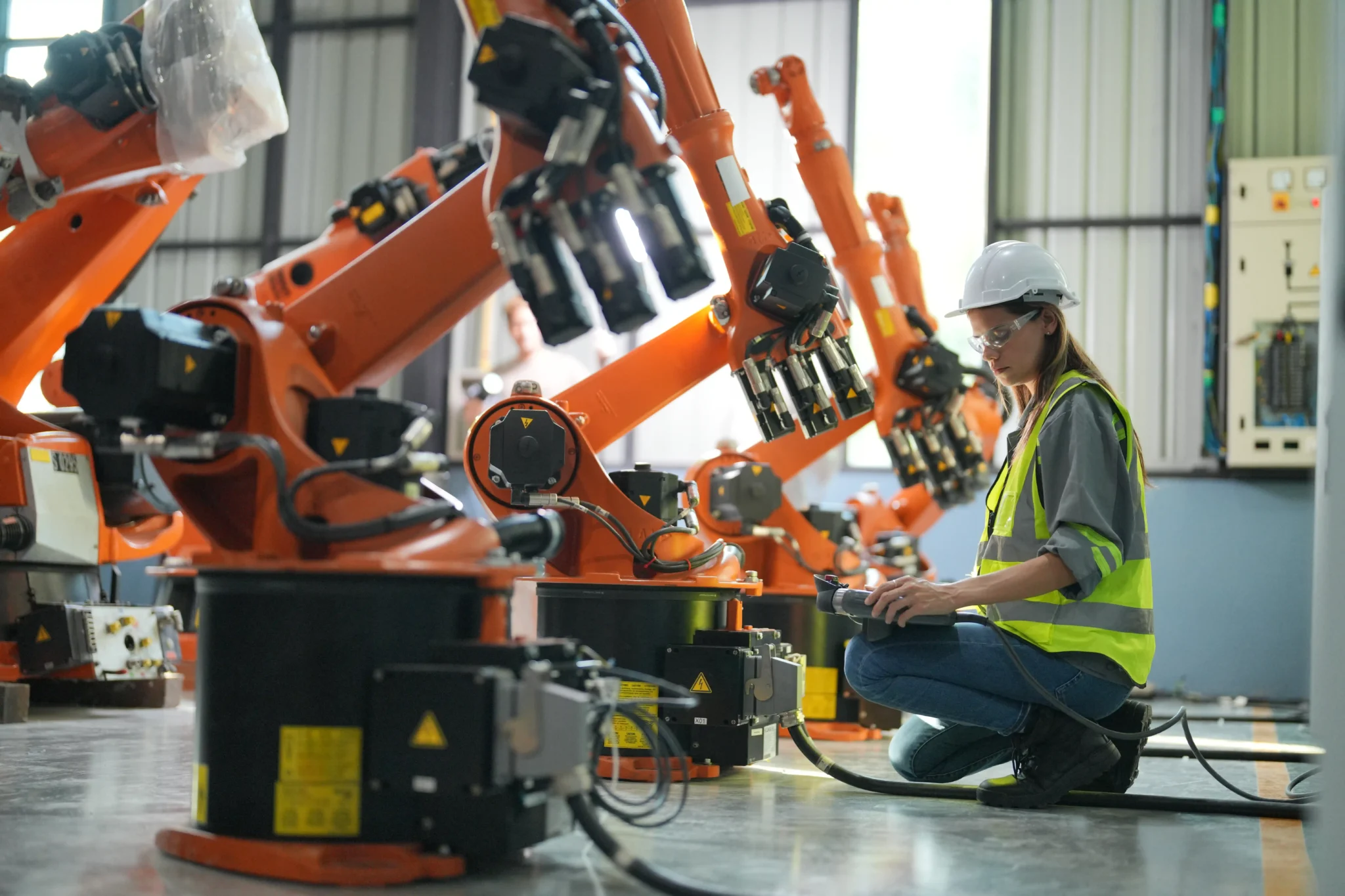 Labour worker working on machinery