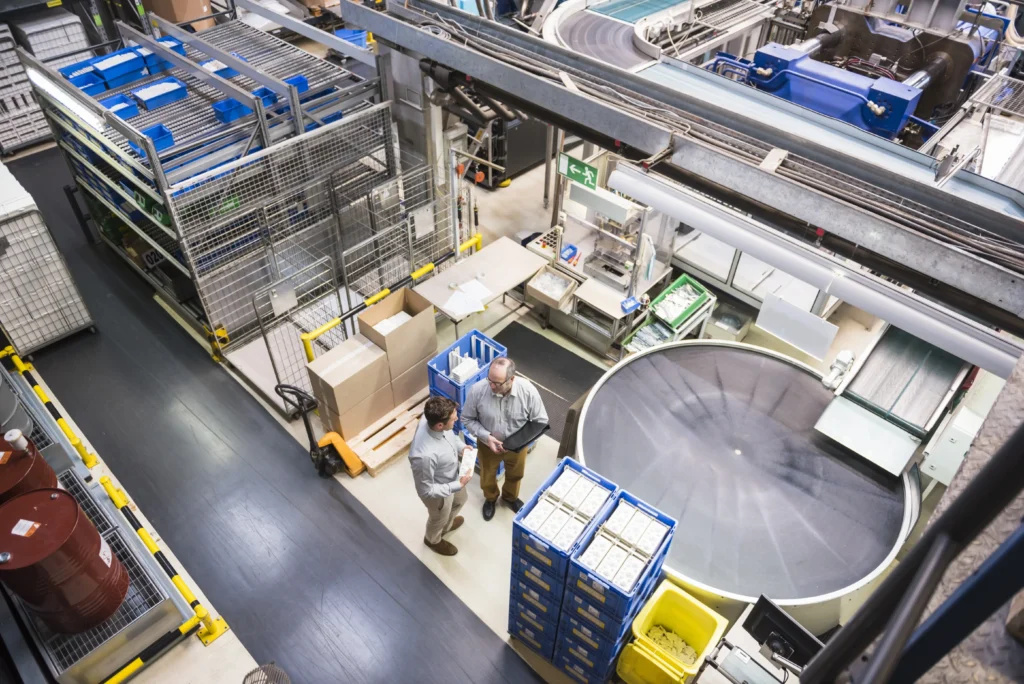 Factory workers on a manufacturing shop floor